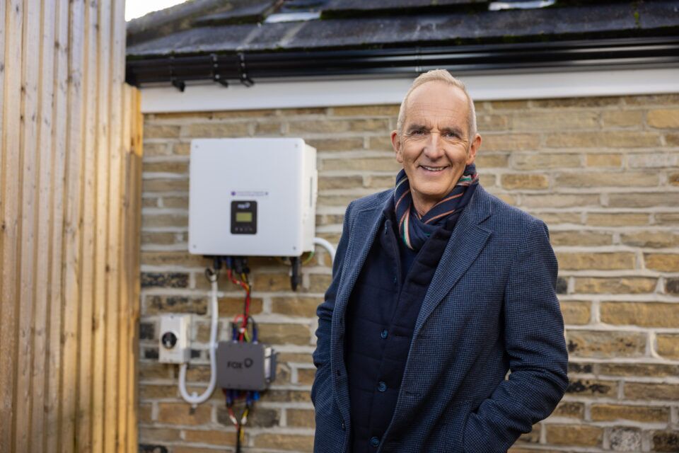 Kevin McCloud beside Project Solar equipment